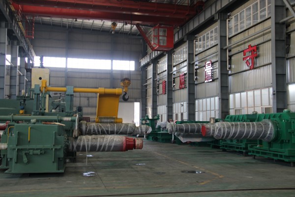 Unwinding coiler machine.